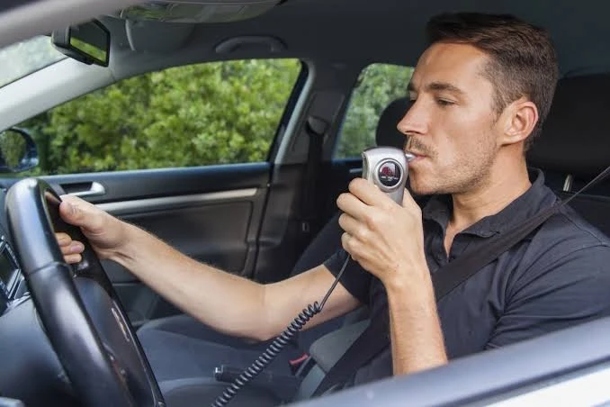 Who may be required to use an ignition interlock device?
